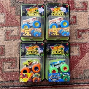 Hot Wheels Lot Of 4 Monster Trucks Glow in the Dark NEW~ BOX DAMAGED